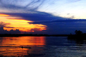 sunset over rio napo in mazan peru