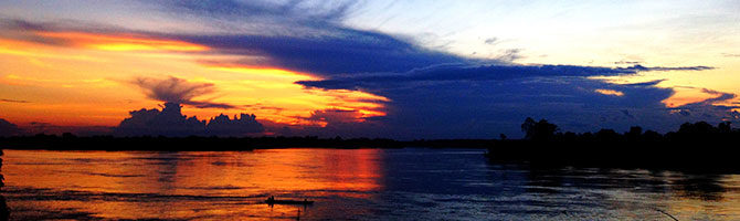sunset over rio napo in mazan peru